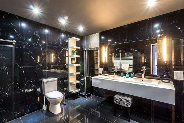  luxury monochromatic bathroom with marble tile