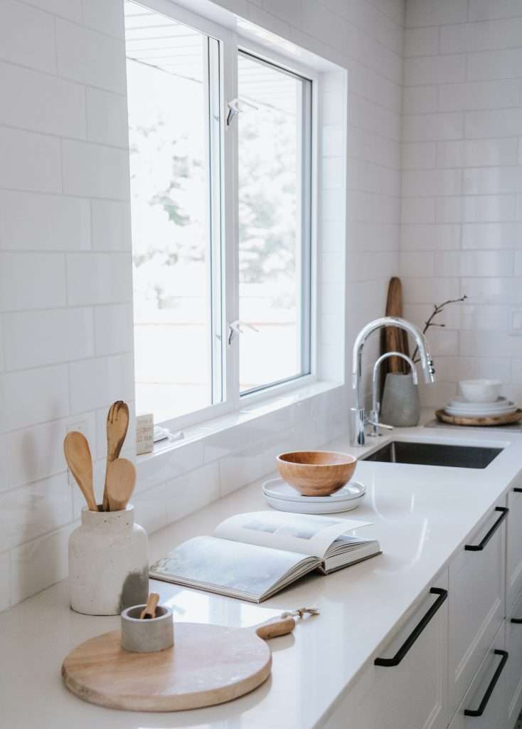  White Ceramic Sink With Stainless Steel Faucet
