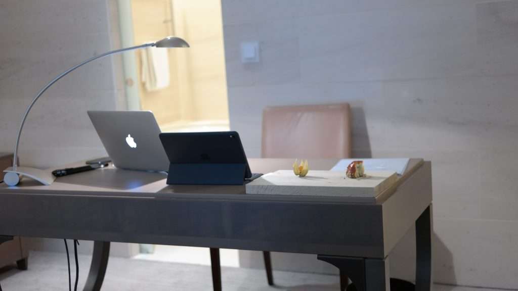 Silver Macbook on Gray Table